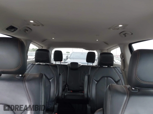 2017 Chrysler Pacifica Touring L with VIN 2C4RC1BG2HR526422, listed as a IAAI auction lot 42032839 with 180,710 mi miles and . Bid and sale history available at DreamBid. Image 8.
