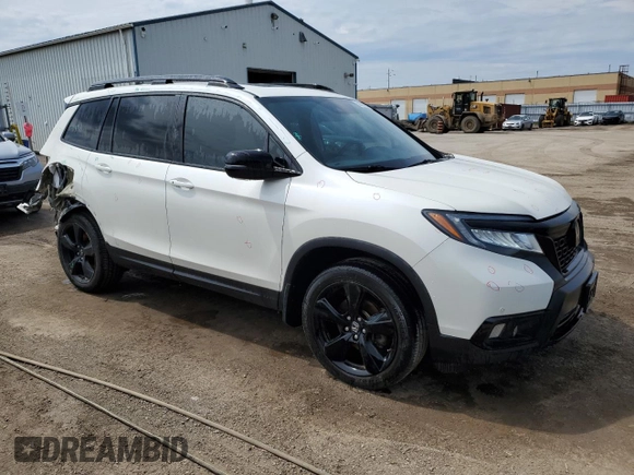 2019 Honda Passport Touring with VIN 5FNYF8H97KB501488, listed as a Copart auction lot 59269085 with 158,006 mi miles and Salvage title. Bid and sale history available at DreamBid. Image 4.