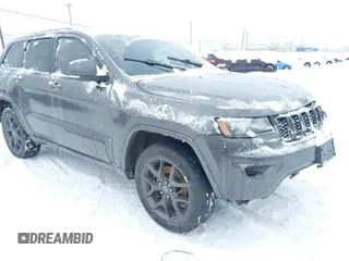 2021 Jeep Grand Cherokee Limited z VIN 1C4RJFBGXMC654414, wystawiony jako IAAI lot #41601774 z przebiegiem 83 654 mil mil oraz . Historia ofert i sprzedaży dostępna na DreamBid. Obrazek 1.