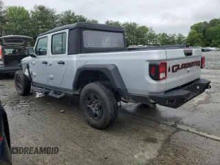 2022 Jeep Gladiator Texas Trail with VIN 1C6HJTAG7NL165957, listed as a Copart auction lot 58309485 with 86,805 mi miles and Salvage title. Bid and sale history available at DreamBid. Image 2.