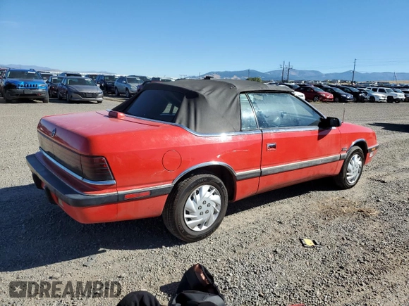 1989 Chrysler LeBaron z VIN 1C3XJ55J9KG275438, wystawiony jako Copart lot #73026764 z przebiegiem 118 347 mil mil oraz Tytuł czysty. Historia ofert i sprzedaży dostępna na DreamBid. Obrazek 3.