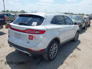 2016 Lincoln MKC Reserve with VIN 5LMCJ3C95GUJ28431, listed as a IAAI auction lot 42049971 with 207,183 mi miles and . Bid and sale history available at DreamBid. Image 4.