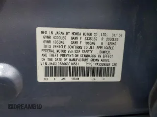 2006 Acura TSX z VIN JH4CL96866C010561, wystawiony jako Copart lot #58495565 z przebiegiem 245 952 mil mil oraz Szkoda całkowita • Salvage title. Historia ofert i sprzedaży dostępna na DreamBid. Obrazek 13.