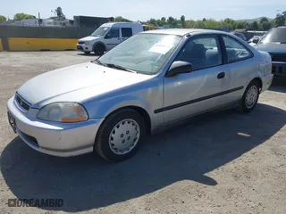 1997 Honda Civic DX with VIN 1HGEJ6220VL106203, listed as a IAAI auction lot 42098813 with 192,343 mi miles. Bid and sale history available at carsss.com. Image 2.