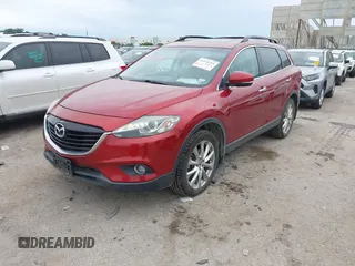 2015 Mazda CX-9 Grand Touring with VIN JM3TB2DA6F0460785, listed as a IAAI auction lot 42474705 with 62,202 mi miles and . Bid and sale history available at DreamBid. Image 17.