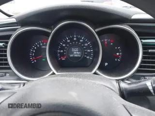 2014 Kia Optima LX z VIN KNAGM4A78E5484514, wystawiony jako IAAI lot #41227492 z przebiegiem 118 531 mil mil oraz . Historia ofert i sprzedaży dostępna na DreamBid. Obrazek 7.