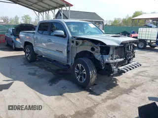 2018 Toyota Tacoma SR with VIN 3TMCZ5AN6JM170128, listed as a IAAI auction lot 42038979 with 59,497 mi miles. Bid and sale history available at carsss.com. Image 1.