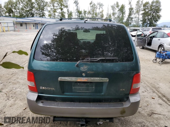2004 Kia Sedona LX with VIN KNDUP131446581402, listed as a Copart auction lot 68083144 with 171,868 mi miles and Clean Title. Bid and sale history available at carsss.com. Image 6.