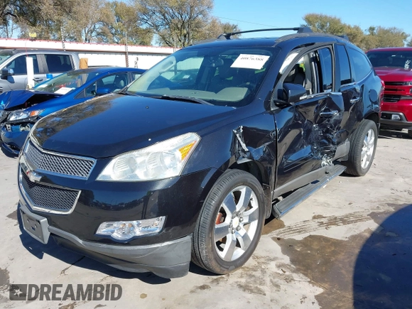 2011 Chevrolet Traverse 1LT z VIN 1GNKRGED3BJ373931, wystawiony jako IAAI lot #40876388 z przebiegiem 234 394 mil mil oraz . Historia ofert i sprzedaży dostępna na DreamBid. Obrazek 2.