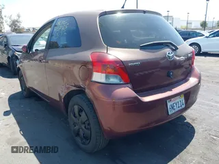 2010 Toyota Yaris with VIN JTDJT4K38A5324103, listed as a IAAI auction lot 41964619 with 149,874 mi miles. Bid and sale history available at carsss.com. Image 3.
