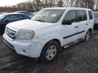 2009 Honda Pilot LX with VIN 5FNYF48239B051599, listed as a IAAI auction lot 41889469 with 999,999 mi miles. Bid and sale history available at carsss.com. Image 2.
