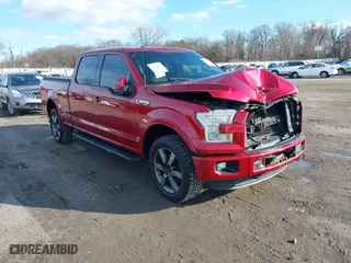 2015 Ford F-150 XLT w/HD Payload Pkg with VIN 1FTFW1EF2FFB76243, listed as a IAAI auction lot 41150866 with 124,478 mi miles. Bid and sale history available at carsss.com. Image 1.