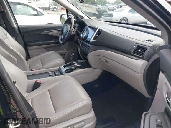 2016 Honda Pilot EX-L with VIN 5FNYF5H59GB025778, listed as a IAAI auction lot 42200829 with 85,556 mi miles and . Bid and sale history available at DreamBid. Image 5.