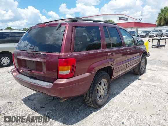 2000 Jeep Grand Cherokee Laredo with VIN 1J4G258S4YC381030, listed as a IAAI auction lot 42541918 with 306,934 mi miles and . Bid and sale history available at DreamBid. Image 4.