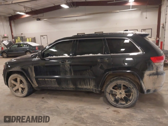 2015 Jeep Grand Cherokee Laredo with VIN 1C4RJFAG3FC607827, listed as a IAAI auction lot 41298397 with 198,171 mi miles. Bid and sale history available at carsss.com. Image 14.