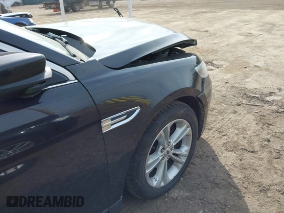 2013 Ford Taurus SEL with VIN 1FAHP2E84DG188503, listed as a IAAI auction lot 41800277 with 215,015 mi miles. Bid and sale history available at carsss.com. Image 6.