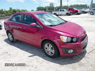 2014 Chevrolet Sonic LT z VIN 1G1JC5SB5E4122840, wystawiony jako IAAI lot #42276390 z przebiegiem 128 958 mil mil oraz . Historia ofert i sprzedaży dostępna na DreamBid. Obrazek 1.