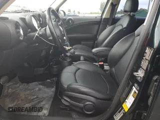 2013 MINI Countryman S ALL4 z VIN WMWZC5C58DWP31357, wystawiony jako Copart lot #51438035 z przebiegiem 98 138 mil mil oraz Szkody całkowita. Historia ofert i sprzedaży dostępna na DreamBid. Obrazek 7.