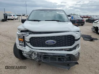 2023 Ford F-150 XL with VIN 1FTFW1E84PKE35275, listed as a Copart auction lot 61867535 with 22,142 mi miles and Salvage title. Bid and sale history available at DreamBid. Image 5.
