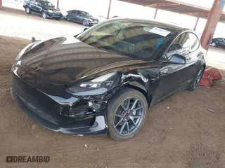 2022 Tesla Model 3 Long Range with VIN 5YJ3E1EBXNF185973, listed as a IAAI auction lot 41692577 with 131,513 mi miles. Bid and sale history available at carsss.com. Image 17.