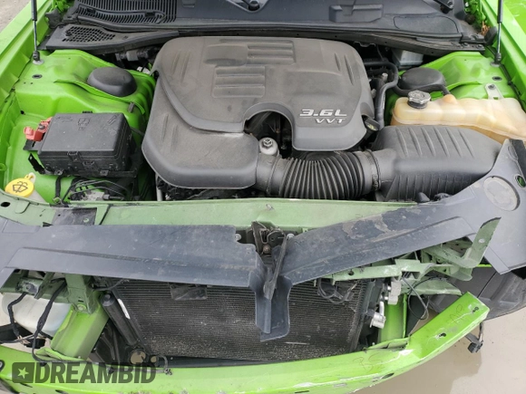 2017 Dodge Challenger SXT z VIN 2C3CDZAG2HH600998, wystawiony jako Copart lot #53380725 z przebiegiem 90 056 mil mil oraz Szkoda całkowita • Salvage title. Historia ofert i sprzedaży dostępna na DreamBid. Obrazek 11.