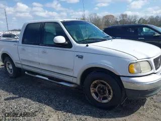2001 Ford F-150 SuperCrew XLT with VIN 1FTRW07W91KE36030, listed as a IAAI auction lot 41718146 with 235,814 mi miles. Bid and sale history available at carsss.com. Image 6.