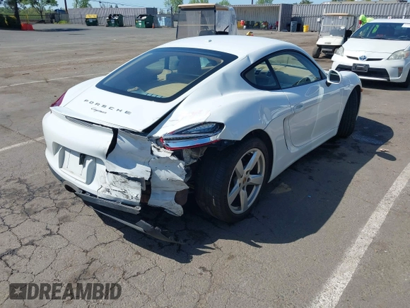 2015 Porsche Cayman with VIN WP0AA2A86FK163282, listed as a IAAI auction lot 42001118 with 101,495 mi miles and . Bid and sale history available at DreamBid. Image 4.