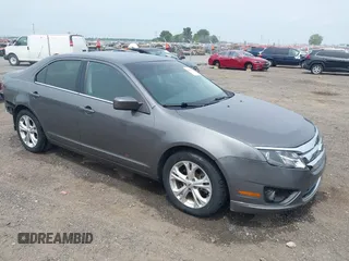 2012 Ford Fusion SE with VIN 3FAHP0HA9CR141588, listed as a IAAI auction lot 42485632 with 124,312 mi miles and . Bid and sale history available at DreamBid. Image 1.
