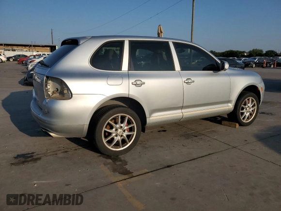 2004 Porsche Cayenne Turbo with VIN WP1AC29P74LA91195, listed as a Copart auction lot 74260594 with 110,729 mi miles and Salvage title. Bid and sale history available at DreamBid. Image 3.