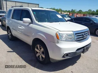 2013 Honda Pilot Touring with VIN 5FNYF4H96DB067995, listed as a IAAI auction lot 41977403 with 129,223 mi miles. Bid and sale history available at carsss.com. Image 1.