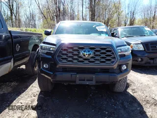 2023 Toyota Tacoma 4WD SR with VIN 3TMCZ5AN4PM625017, listed as a IAAI auction lot 41207111 with 38,582 mi miles. Bid and sale history available at carsss.com. Image 13.