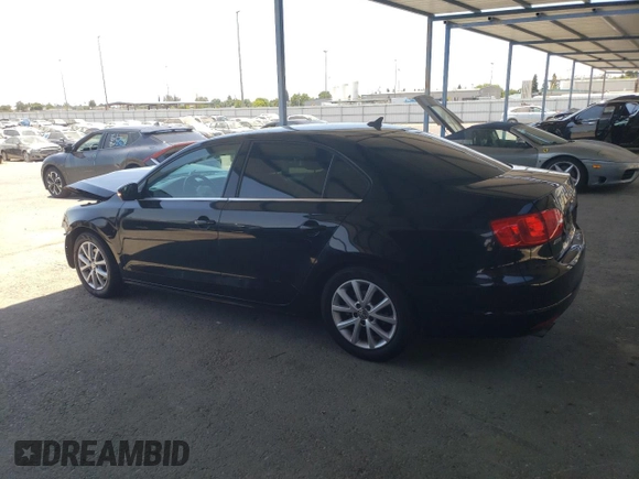 2014 Volkswagen Jetta SE with VIN 3VWD17AJXEM445488, listed as a Copart auction lot 65282425 with 159,356 mi miles and Salvage title. Bid and sale history available at DreamBid. Image 2.