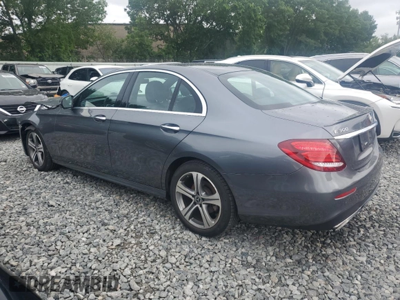 2019 Mercedes-Benz E 300 with VIN WDDZF4KB7KA553856, listed as a Copart auction lot 61025735 with 59,001 mi miles and Salvage title. Bid and sale history available at DreamBid. Image 2.