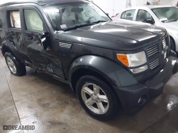 2010 Dodge Nitro SXT with VIN 1D4PU5GK0AW126478, listed as a IAAI auction lot 41362674 with 171,704 mi miles. Bid and sale history available at carsss.com. Image 1.