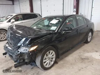 2024 Toyota Camry LE with VIN 4T1R11AK1RU242727, listed as a IAAI auction lot 41560624 with 26,098 mi miles. Bid and sale history available at carsss.com. Image 2.