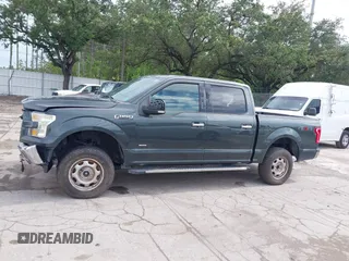 2015 Ford F-150 XLT with VIN 1FTEW1EG5FFA99713, listed as a IAAI auction lot 42481854 with 165,415 mi miles and . Bid and sale history available at DreamBid. Image 14.