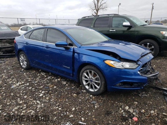 2017 Ford Fusion Hybrid SE with VIN 3FA6P0LU9HR385385, listed as a Copart auction lot 48885275 with 141,201 mi miles and Non repairable. Bid and sale history available at DreamBid. Image 4.