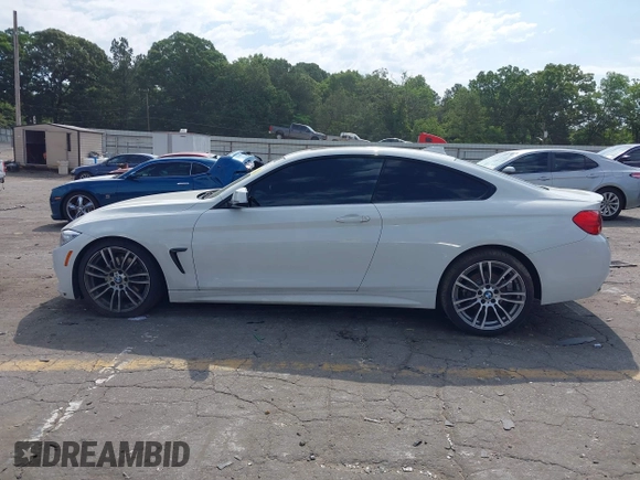 2015 BMW 4 Series 428i z VIN WBA3N3C55FK233907, wystawiony jako IAAI lot #42335053 z przebiegiem 45 000 mil mil oraz . Historia ofert i sprzedaży dostępna na DreamBid. Obrazek 13.