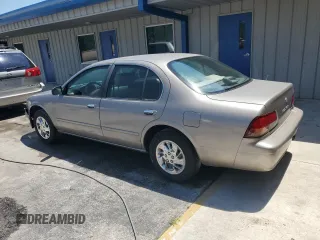 1998 Nissan Maxima GXE с VIN JN1CA21D0WT525657, выставлен на аукционе Copart как лот 57055485 с пробегом Не указан миль и Списание • Salvage title. История ставок и продаж доступна на DreamBid. Изображение 2.