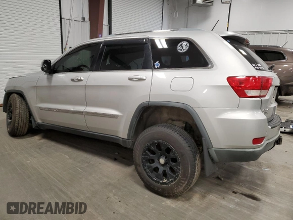 2011 Jeep Grand Cherokee Laredo z VIN 1J4RR4GGXBC609891, wystawiony jako Copart lot #52089645 z przebiegiem 180 895 mil mil oraz Szkoda całkowita • Salvage title. Historia ofert i sprzedaży dostępna na DreamBid. Obrazek 2.