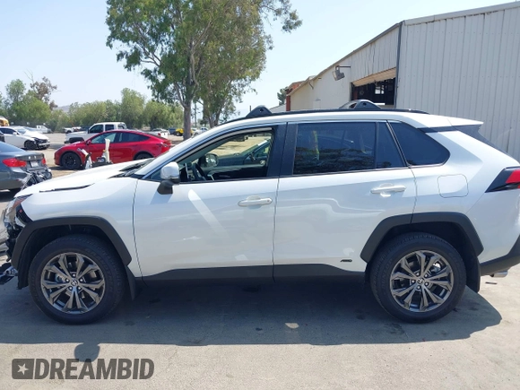 2024 Toyota RAV4 Hybrid XLE Premium with VIN JTMB6RFV9RJ063328, listed as a IAAI auction lot 42433233 with 9,874 mi miles and . Bid and sale history available at DreamBid. Image 15.