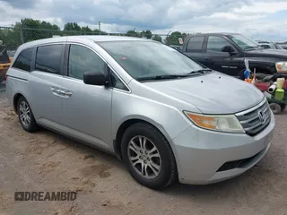 2011 Honda Odyssey EX with VIN 5FNRL5H42BB010682, listed as a IAAI auction lot 42546258 with 107,128 mi miles and . Bid and sale history available at DreamBid. Image 1.
