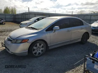 2006 Honda Civic LX with VIN JHMFA16596S000414, listed as a Copart auction lot 53578795 with 243,367 mi miles and Clean Title. Bid and sale history available at DreamBid. Image 1.