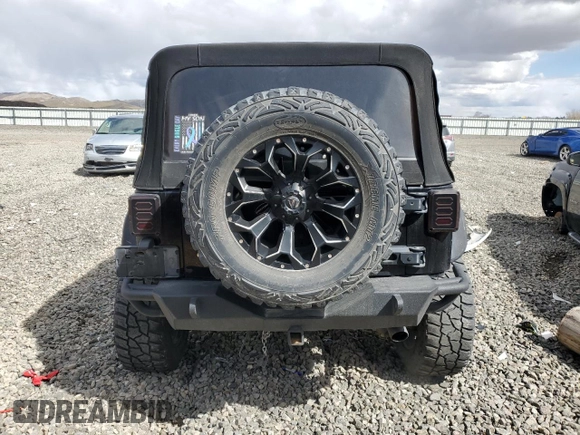 2010 Jeep Wrangler Unlimited Sahara with VIN 1J4HA5H13AL182071, listed as a Copart auction lot 51696665 with 178,026 mi miles and Salvage Title. Bid and sale history available at carsss.com. Image 6.