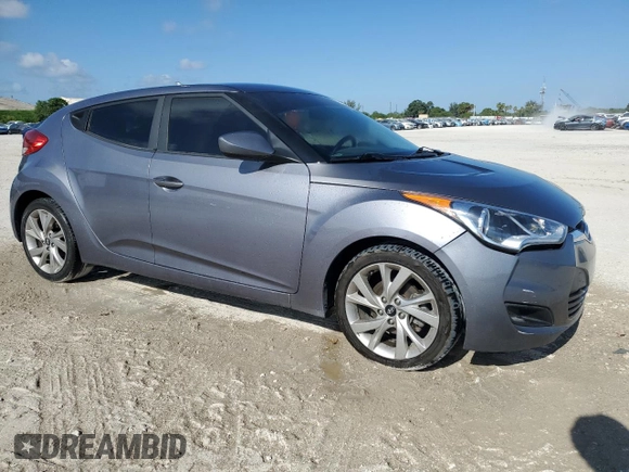 2016 Hyundai Veloster z VIN KMHTC6AD7GU300528, wystawiony jako Copart lot #57501955 z przebiegiem 72 437 mil mil oraz Szkoda całkowita • Salvage title. Historia ofert i sprzedaży dostępna na DreamBid. Obrazek 4.