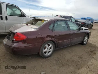 2001 Ford Taurus SES with VIN 1FAFP55S61G184193, listed as a Copart auction lot 49190475 with 129,415 mi miles and Salvage Title. Bid and sale history available at DreamBid. Image 3.