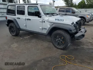 2023 Jeep Wrangler z VIN 1C4JJXN64PW630179, wystawiony jako Copart lot #53879415 z przebiegiem 27 905 mil mil oraz Czysty tytuł • Clean title. Historia ofert i sprzedaży dostępna na DreamBid. Obrazek 4.