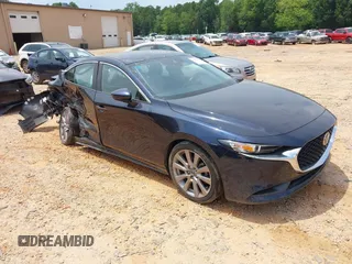 2021 Mazda 3 Select with VIN JM1BPABL6M1326449, listed as a IAAI auction lot 42586971 with 62,904 mi miles and . Bid and sale history available at DreamBid. Image 1.