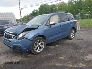 2018 Subaru Forester Touring with VIN JF2SJAWC5JH528330, listed as a IAAI auction lot 42344618 with 62,446 mi miles and . Bid and sale history available at DreamBid. Image 2.