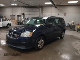 2012 Dodge Grand Caravan SE with VIN 2C4RDGBG8CR367236, listed as a IAAI auction lot 40041863 with 166,555 mi miles and . Bid and sale history available at DreamBid. Image 2.